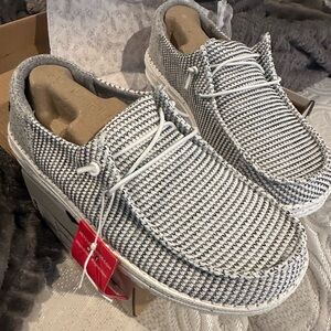 New, never worn Hey Dudes